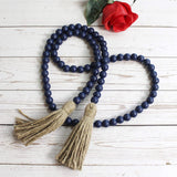 CVHOMEDECO. Wood Beads Garland with Tassels Farmhouse Rustic Wooden Prayer Bead String Wall Hanging Accent for Home Festival Decor. Navy Blue
